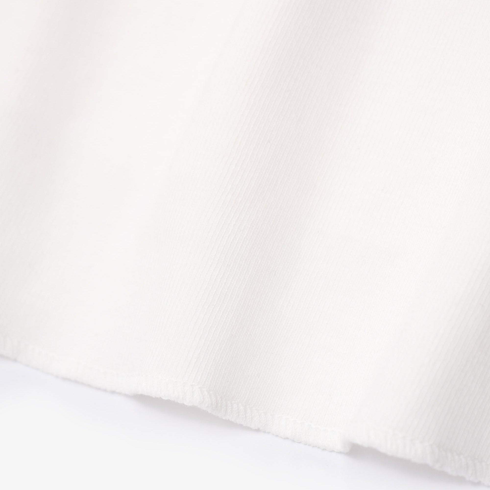 Close-up of a white fabric texture
