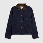 A dark navy blue patchwork canvas jacket with a brown corduroy collar, featuring a button-up front and a chest pocket, displayed on a light gray background.